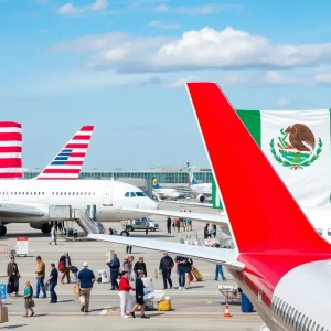 Airport with airplanes and U.S. Mexico flags