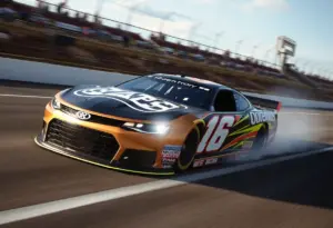 NASCAR race car speeding on a racetrack